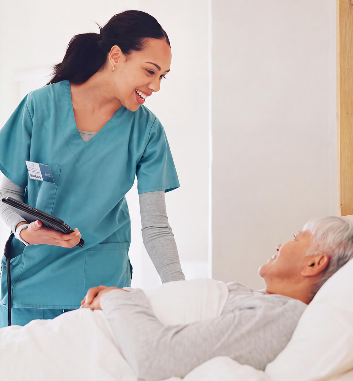 A physician greets a patient before undergoing CVAC System treatment for kidney stones
